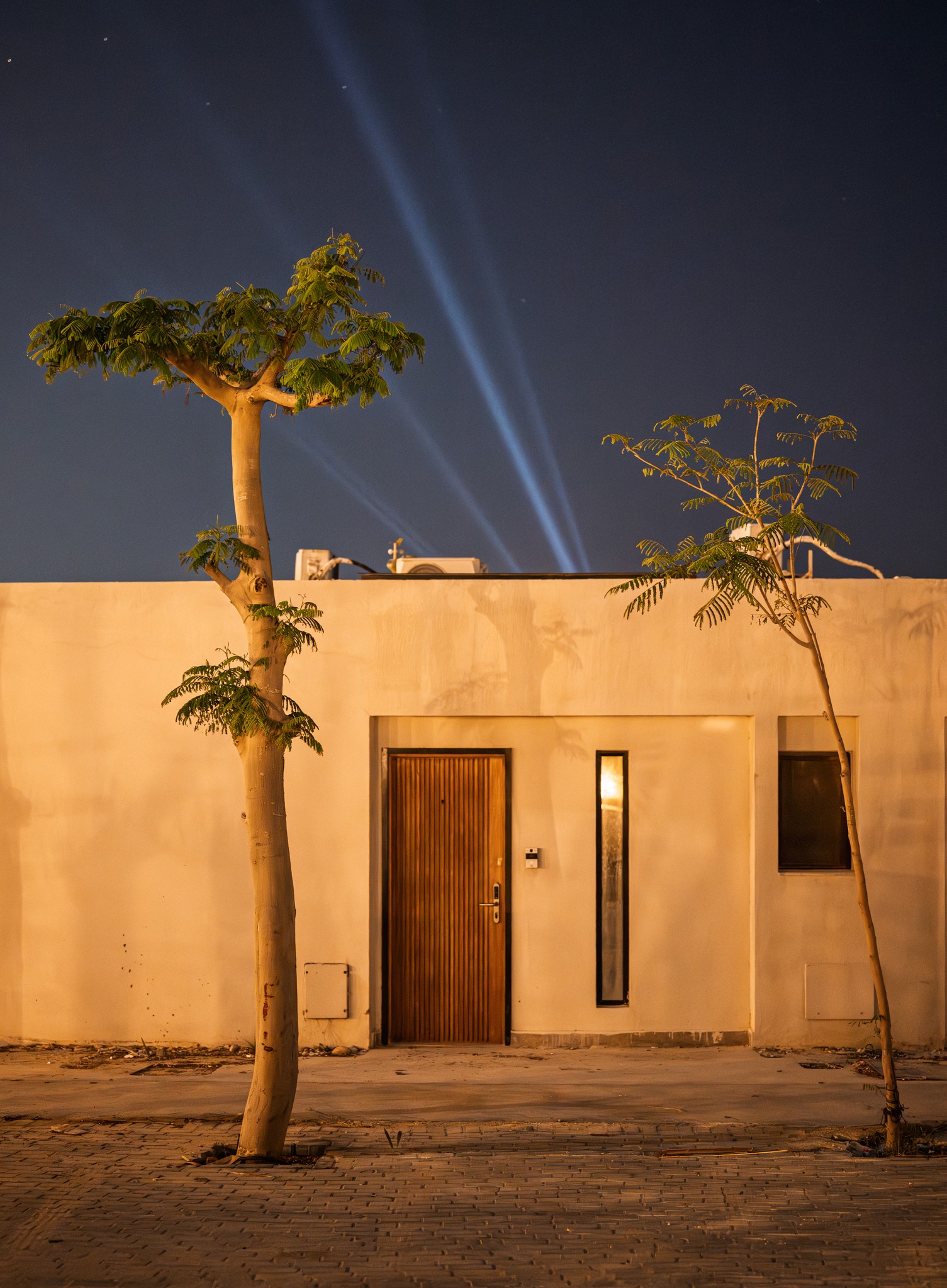 Egyptian Desert Night: A Simple Door Under Star Trails