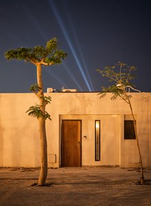 Egyptian Desert Night: A Simple Door Under Star Trails