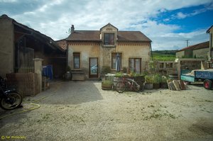 Rustic French Courtyard with Vintage Charm