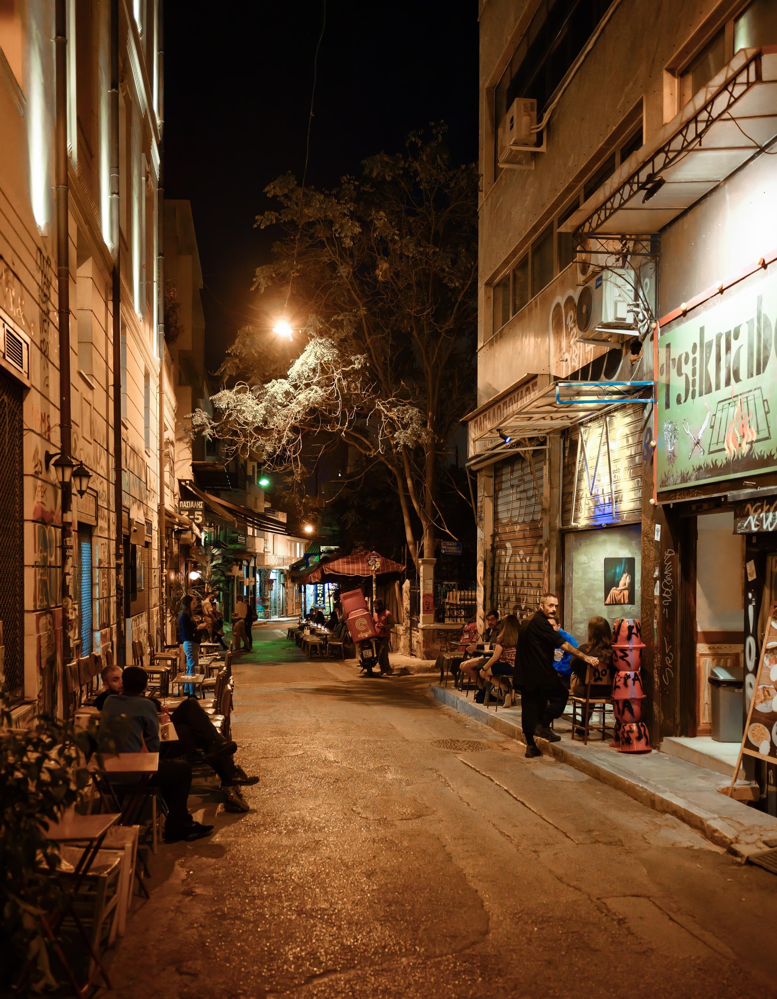 Greek Nightlife: A Cozy Street Scene in Full Swing