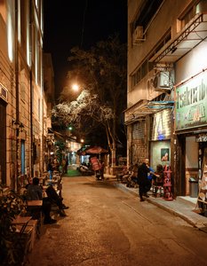 Greek Nightlife: A Cozy Street Scene in Full Swing