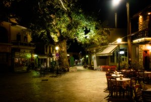 Greek Night: Cobblestone Streets and Warm Restaurant Lights