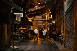 Athenian Nightlife: A Narrow Street Buzzing with Energy