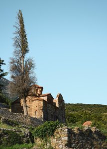 Ancient Stone Church Amidst Greek Hills
