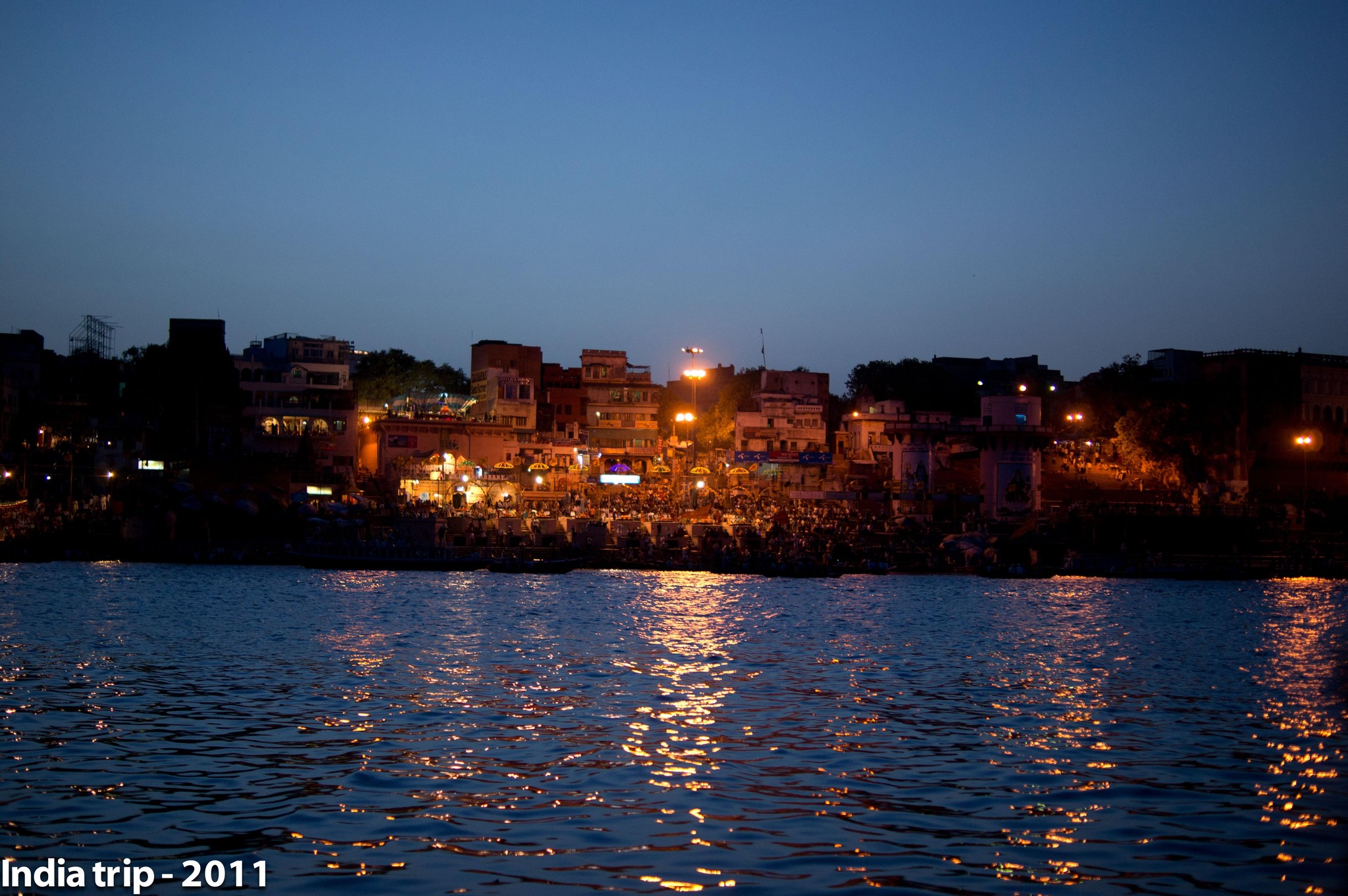 Varanasi Ghats at Dusk: Lights Reflecting on the Ganges