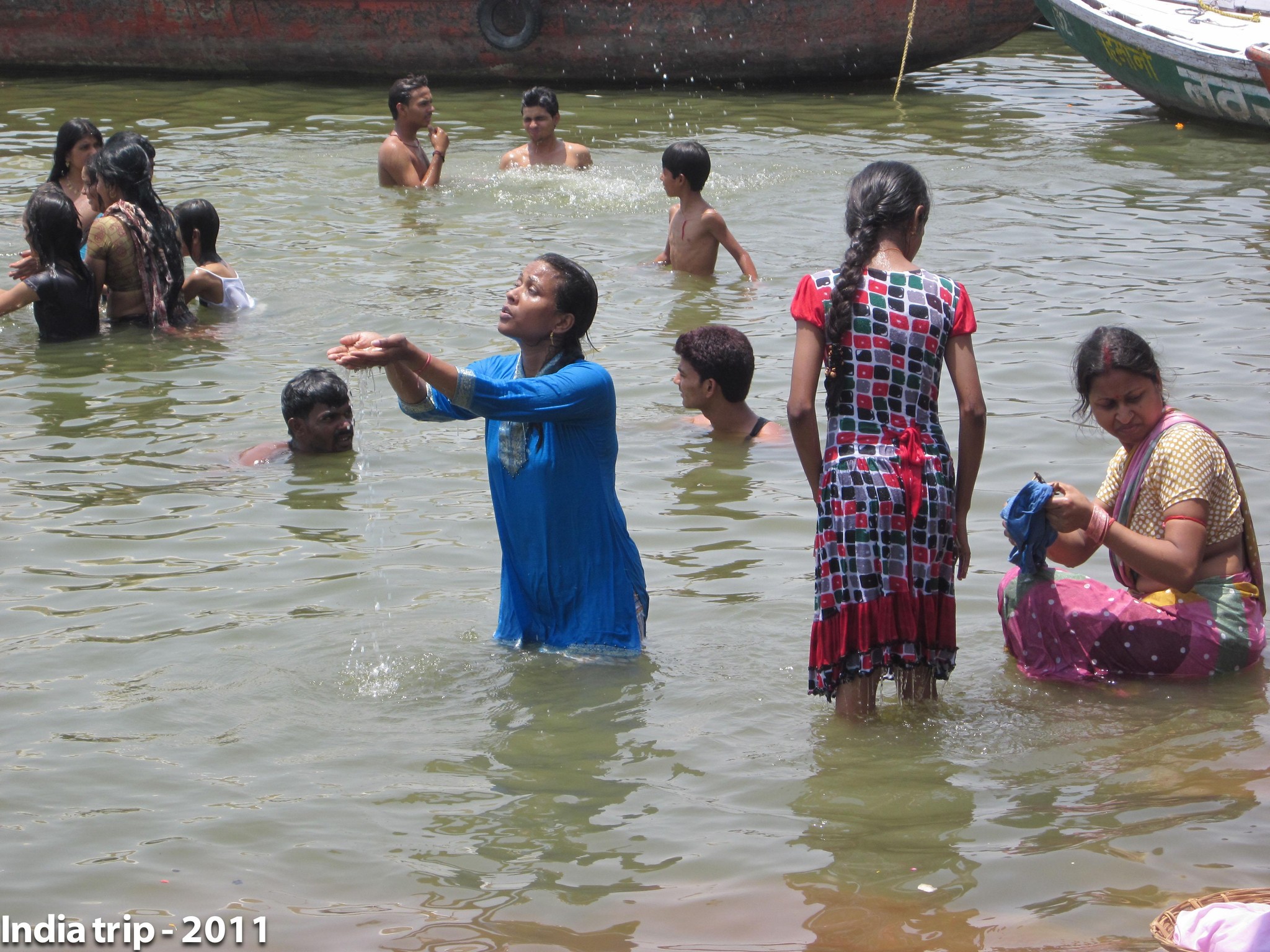 Sacred Dip: Pilgrims Bathing in the Ganges River, India