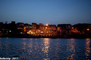 Varanasi Ghats at Dusk: Lights Reflecting on the Ganges