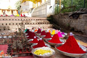 Vibrant Holi Colors and Offerings at an Indian Temple