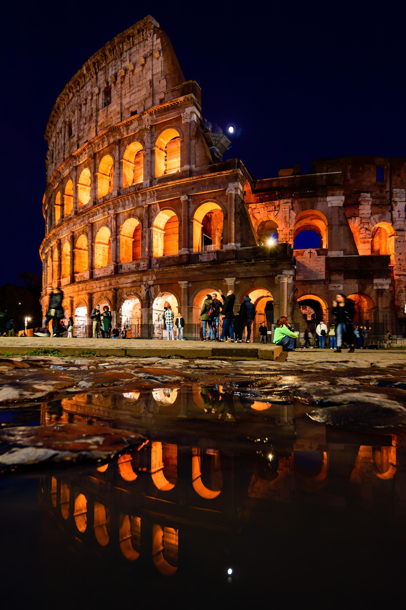Roman Nights: Colosseum Reflections Under the Moon