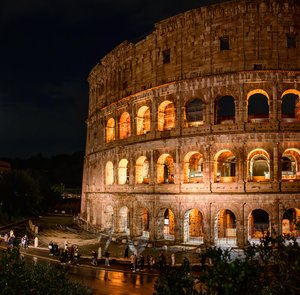 Roman Colosseum Illuminated at Night