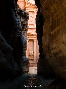 The Siq's Embrace: A Glimpse of Petra's Treasury