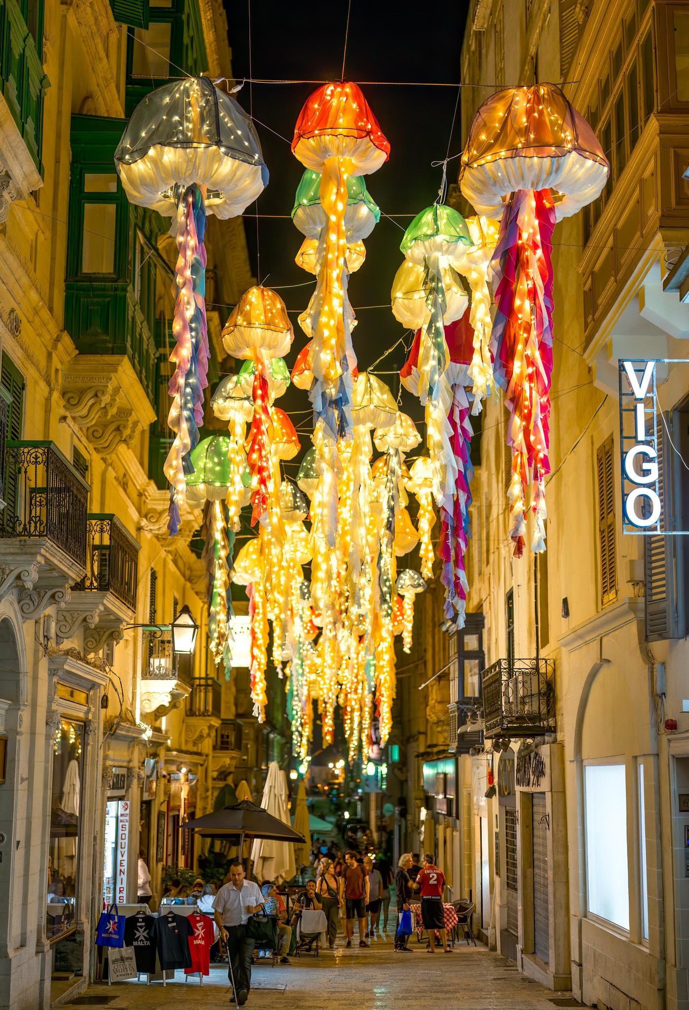 Festive Maltese Street Adorned with Illuminated Jellyfish