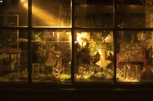 New Orleans Mask Shop Window Display at Night