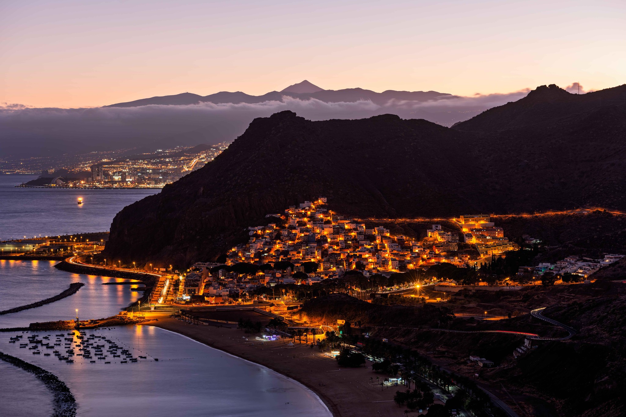Coastal Village Lights Embrace Tenerife's Dramatic Landscape at 
