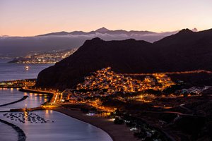 Coastal Village Lights Embrace Tenerife's Dramatic Landscape at 