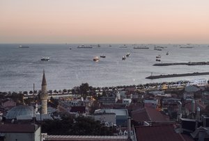 Istanbul Skyline with Bosphorus Shipping Traffic at Dusk