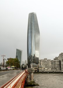 The Shard Reflects London's Skyline on a Cloudy Day